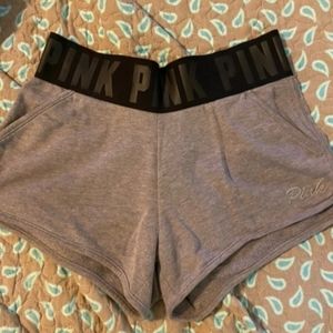 Grey shorts with black waist band
